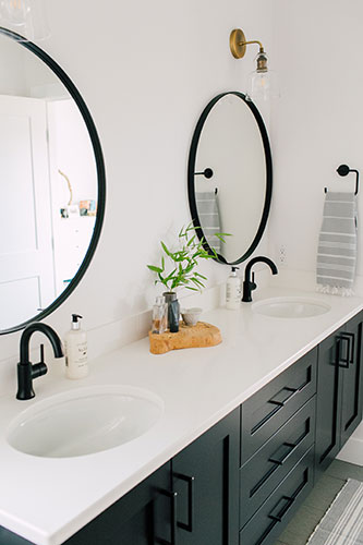 homes-ft-4 Black and white craftsman bathroom in a custom home